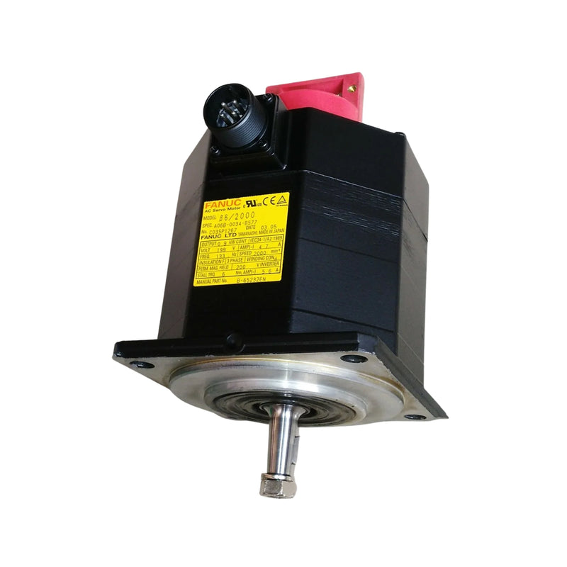 FANUC A06B-0034-B577 AC servo motor with brake and tapered shaft for CNC automation.